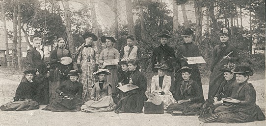 Lizzie Kirk's painting class. Lizzie is seated on the far right.