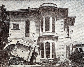Old newspaper photo showing damage to front porch from the 1906 earthquake