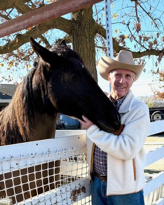 Al visiting with one of the horses at One Step Closer ranch, a Farrington grant recipient